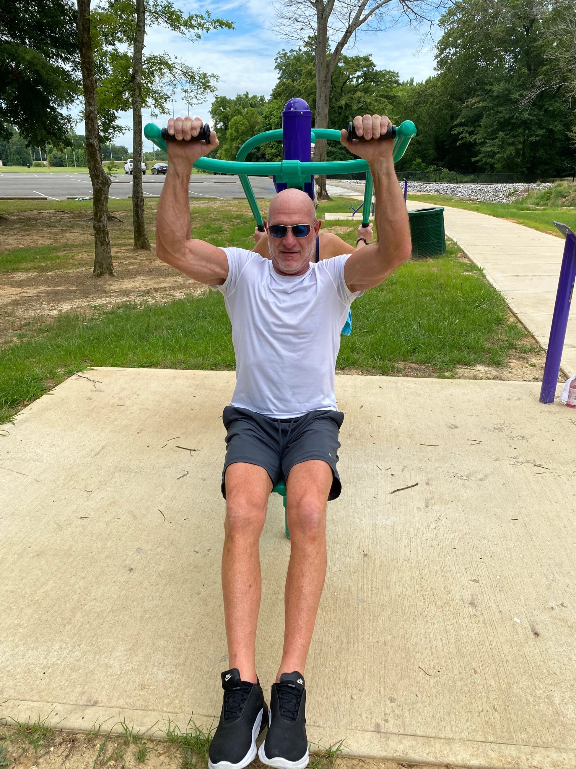 Man Using Lat Pull Equipment