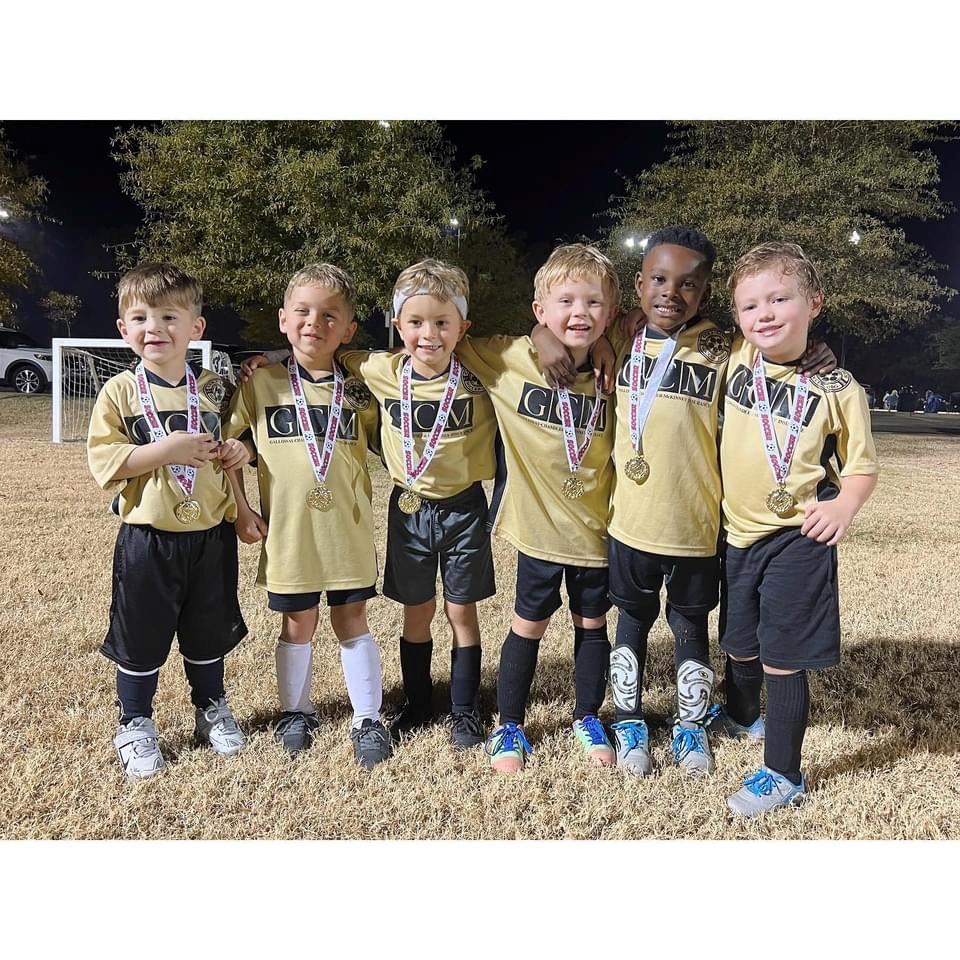 Group of Soccer Boys Wearing Medals